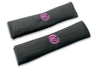 VW Graffiti logo embroidered seat belt covers shown in black with pink embroidery