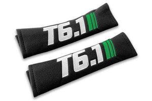 T6.1 Stripes logo embroidered on padded seat belt covers shown in black with white and green embroidery.