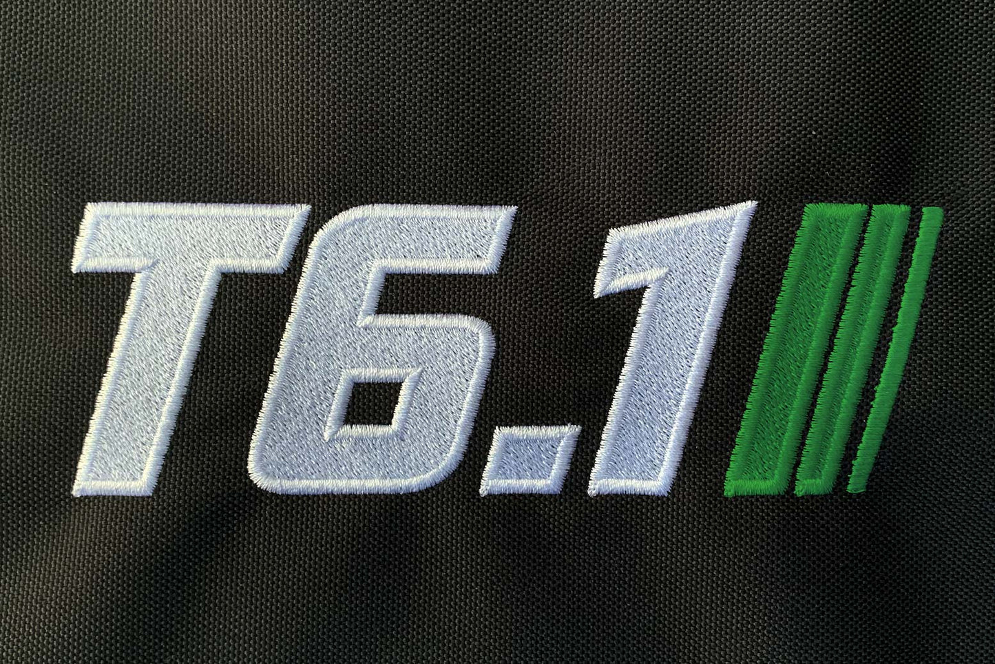 T6 point 1 embroidered logo with white text green stripe detail