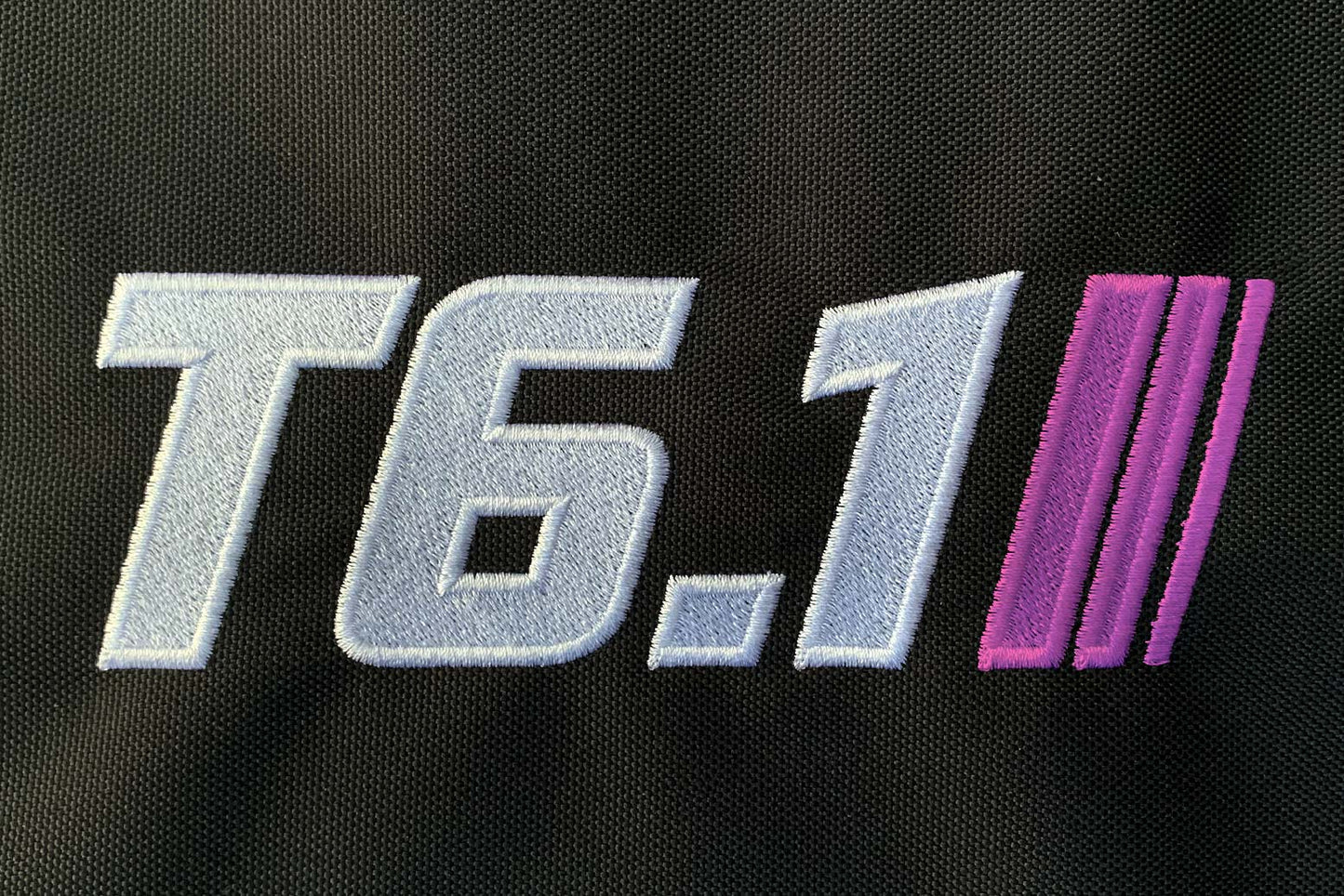 T6 point 1 embroidered logo with white text pink stripe detail