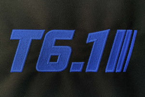 T6 point 1 embroidered logo with blue text and stripe detail