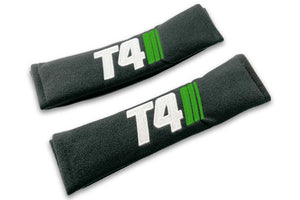 T4 Stripes logo embroidered on padded seat belt covers shown in black with white and green embroidery.