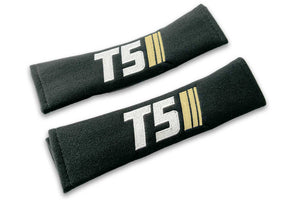 T5 Stripes logo embroidered on padded seat belt covers shown in black with white and cream embroidery.