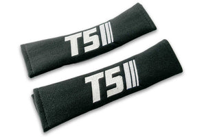 T5 Stripes logo embroidered on padded seat belt covers shown in black with white embroidery.
