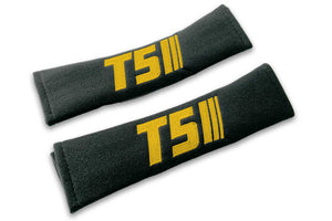 T5 Stripes single colour logo embroidered on padded seat belt covers shown in black with yellow embroidery.