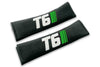 T6 Stripes logo embroidered on padded seat belt covers shown in black with white and green embroidery.