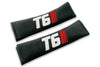 T6 Stripes logo embroidered on padded seat belt covers shown in black with white and red embroidery.