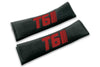 T6 Stripes single colour logo embroidered on padded seat belt covers shown in black with burgundy embroidery.