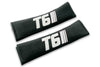 T6 Stripes logo embroidered on padded seat belt covers shown in black with white embroidery.