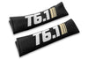 T6.1 Stripes logo embroidered on padded seat belt covers shown in black with white and cream embroidery.