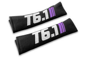 T6.1 Stripes logo embroidered on padded seat belt covers shown in black with white and purple embroidery.