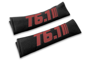T6.1 Stripes single colour logo embroidered on padded seat belt covers shown in black with burgundy embroidery.