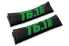 T6.1 Stripes single colour logo embroidered on padded seat belt covers shown in black with green embroidery.