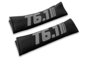 T6.1 Stripes single colour logo embroidered on padded seat belt covers shown in black with grey embroidery.