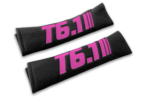 T6.1 Stripes single colour logo embroidered on padded seat belt covers shown in black with pink embroidery.