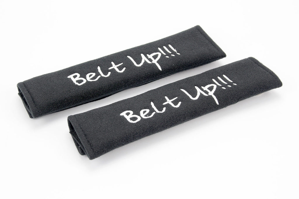 Belt Up! logo in white embroidery on padded seat belt covers.