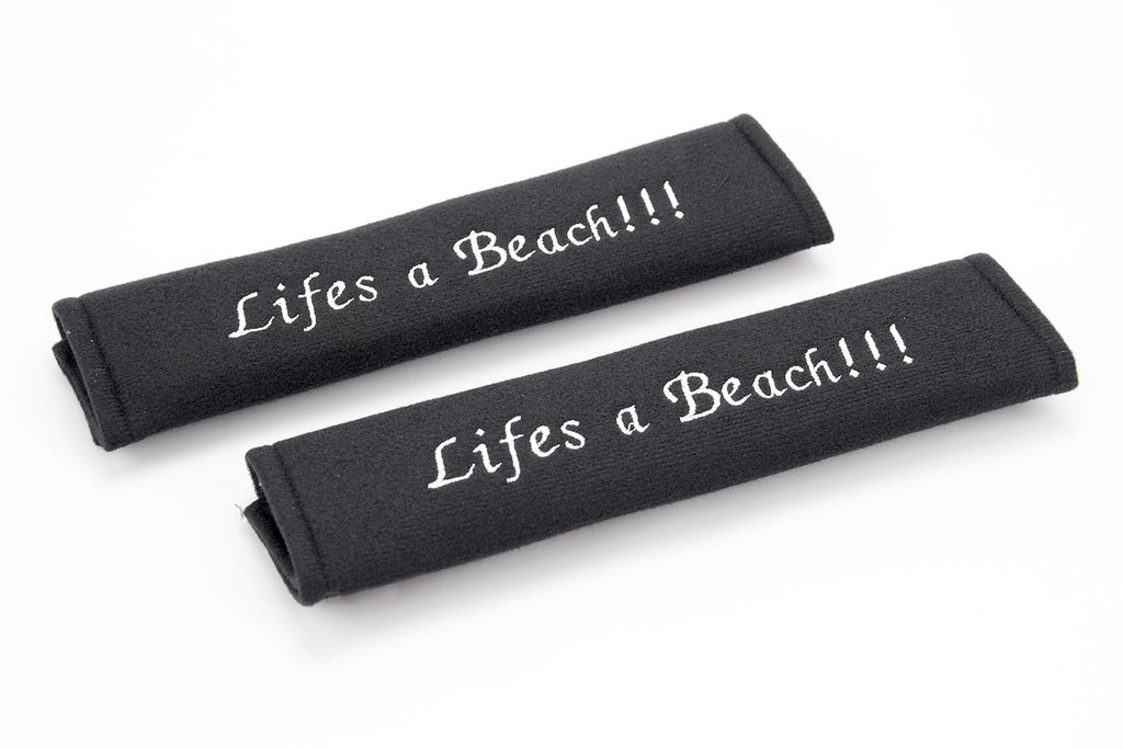 Embroidered padded seat belt cover with lifes a beach logo
