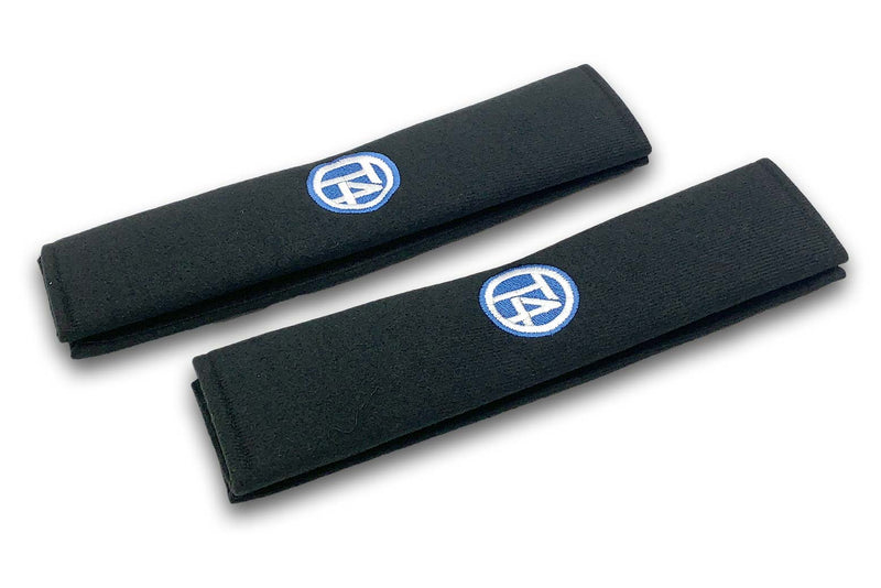 T4 Circle logo embroidered seat belt covers shown in black with blue and white embroidery