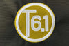 T6 point 1 embroidered circle logo with white text over a yellow background
