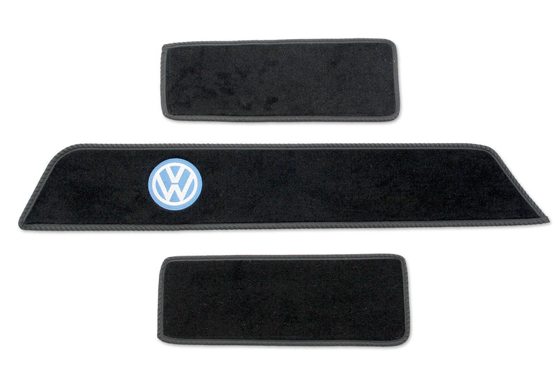 T6 side steps mats with classic blue VW embroidered logo shown on black automotive carpet