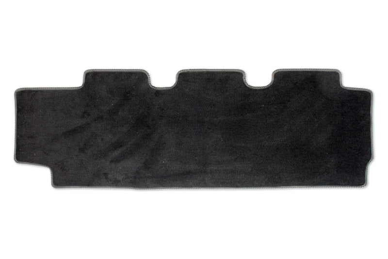 Kombi rear mat for a triple seat with single slider door shown in black tread plate rubber