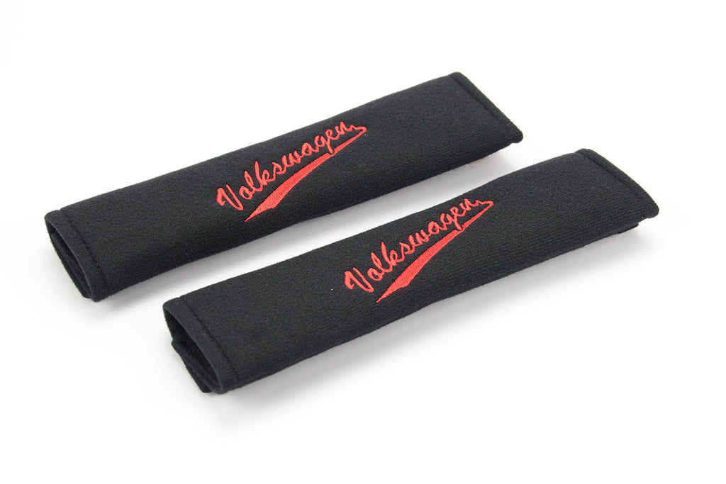 Embroidered padded seat belt cover with Volkswagen swoosh logo